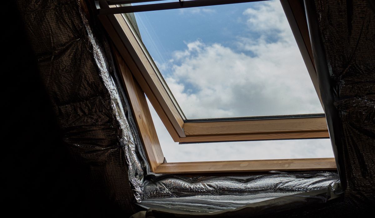 Building Shelves Between Exposed Rafters for Books